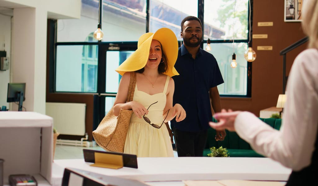 Guest arriving at reception desk